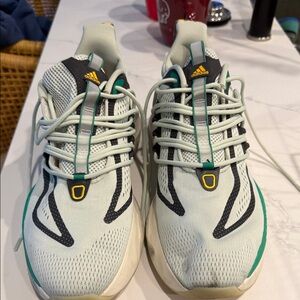 Adidas men’s Sneakers - White, Black, Orange and Green 13